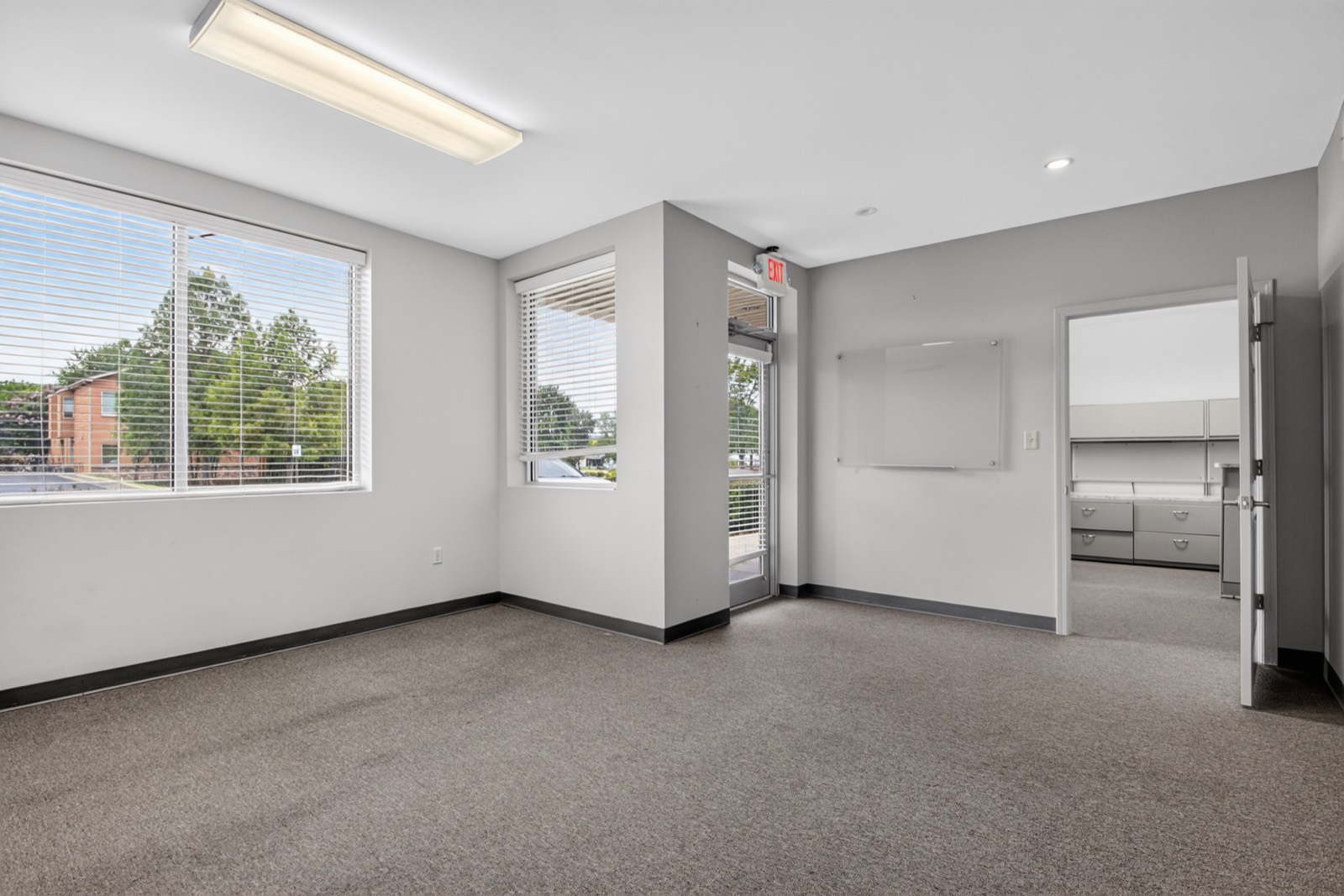 Open office suite with natural light at Highway 10 Office Park